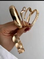 ⁦طقم  12 إسورة نسائية معدنية عريضة باللون الذهبي⁩ - الصورة ⁦15⁩